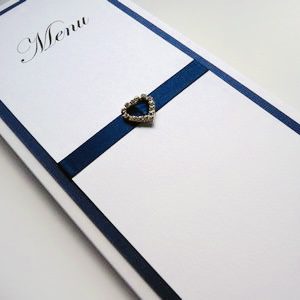 Menu with heart shaped fancy ribbon buckle