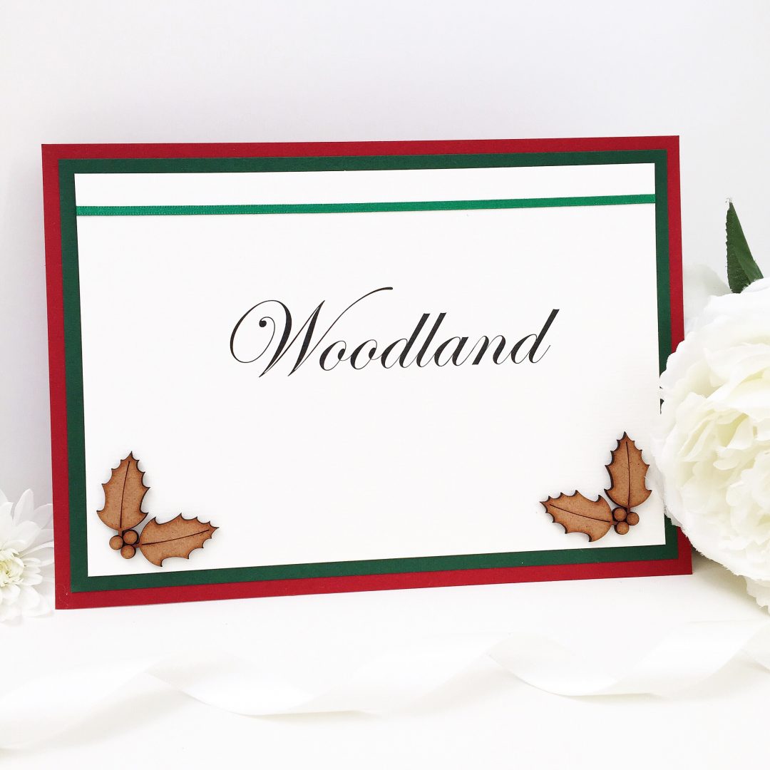 rustic-winter-holly-themed-table-name-signs-with-wooden-holly