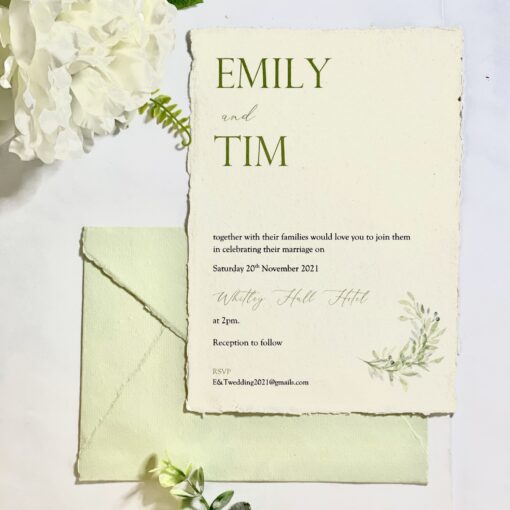 Cotton paper invitation with leaf design and matching envelope