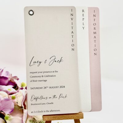 Layered invitation with eyelet and timeline